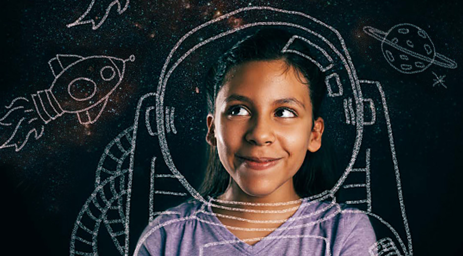 Girl with chalk drawing of astronaut around her
